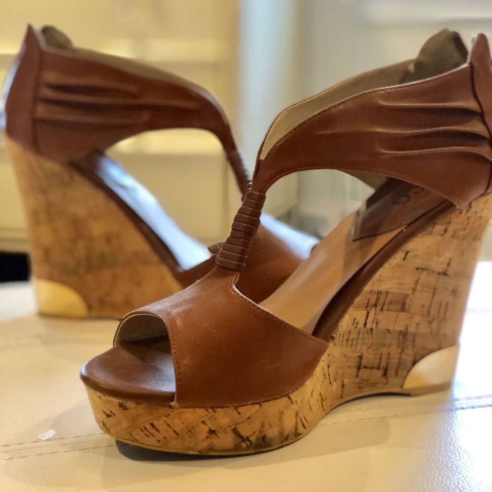 Bucco wedge sandals in camel.